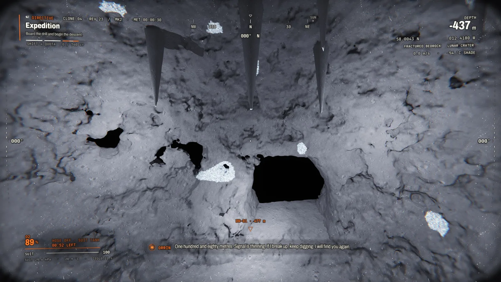 A deep cave 437 metres down with rock spires hanging from the ceiling and a dark passage ahead