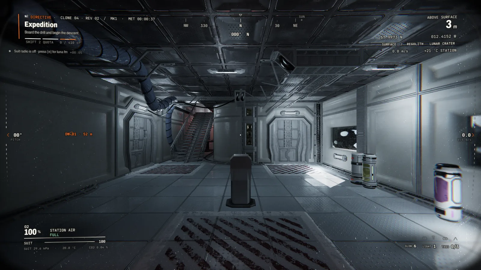 Inside the SELENE station: a metal corridor, hatches, crates and the helmet HUD